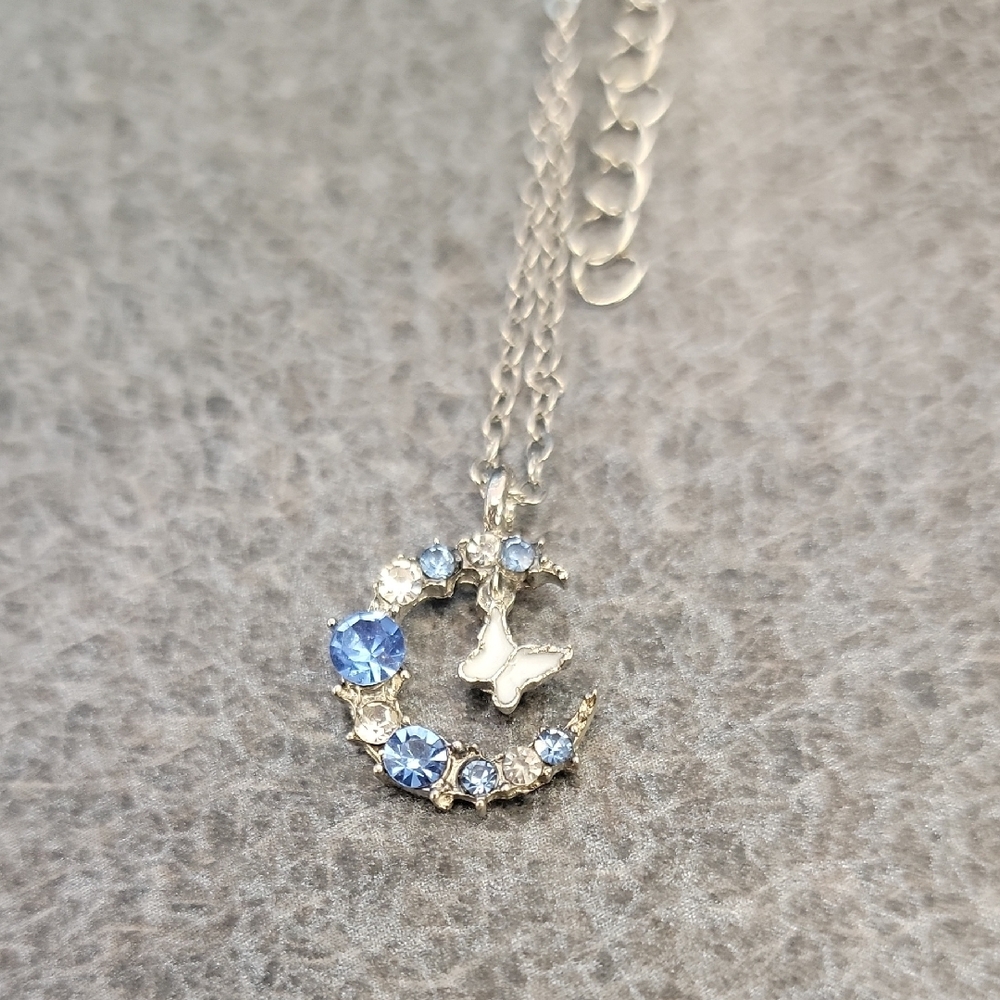 Elegant Silver and Blue Crescent Necklace